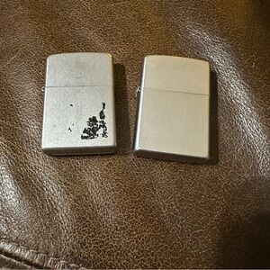 Lot of 2 Zippo cigarette lighters, 2000 & 2007 Read Description